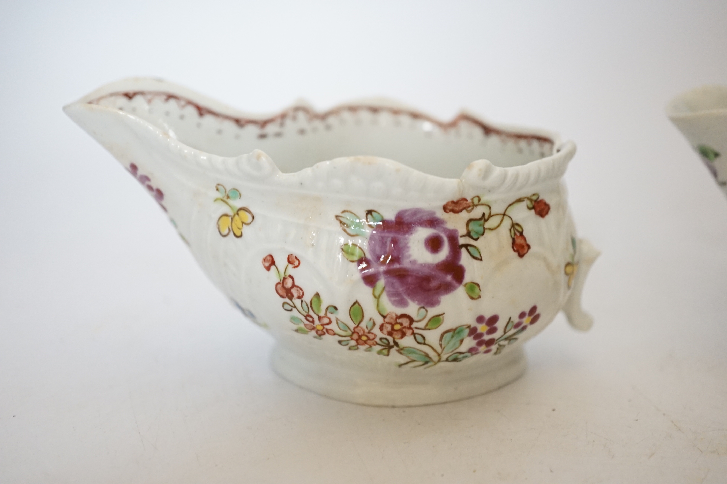 A Chaffers Liverpool saucer, c.1760 and two 18th century Christian or Pennington sauceboats, saucer 12cm diameter